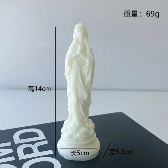 Virgin Mary scented candle.